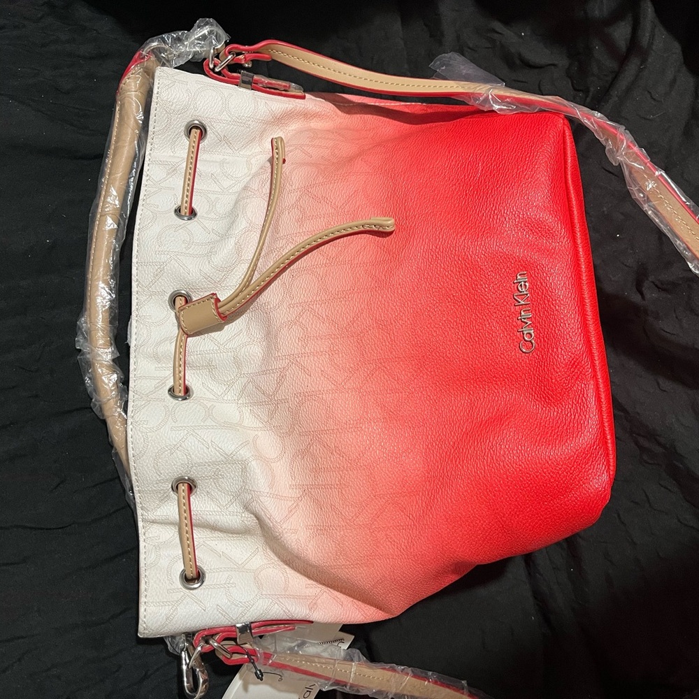 Calvin Klein Beautiful  new with tags. There are a few imperfections. See pics